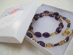 Mardi Gras Ready: An Amethyst, Citrine and Rondelle Necklace From Gemstrings By Phyllis & Terry | Value: $65