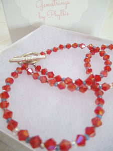 Holiday Sparkle In Red & Green: A Swarovski Crystal Necklace From Gemstrings By Phyllis & Terry | Value: $25